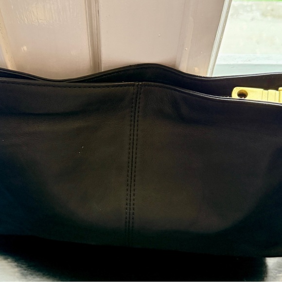 Crossbody or shoulder bag in black leather with gold studs. - Picture 2 of 8